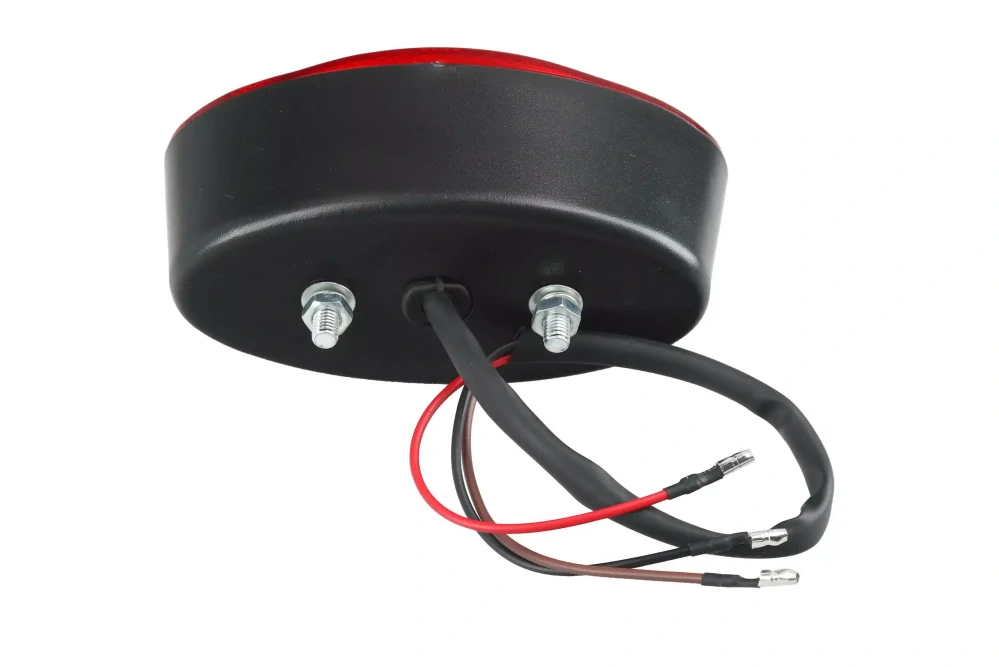 Světlo "Cat-Eye" koncové, 130 x 68 mm černé, červené sklo